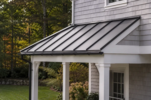 Standing seam metal roofing detail on a Worcester MA home