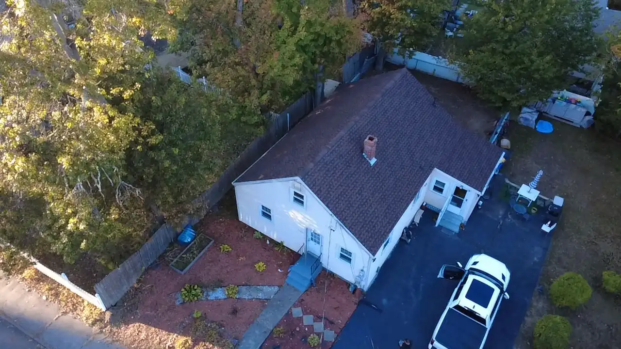 Skylight installation and re-flashing on a New England roof