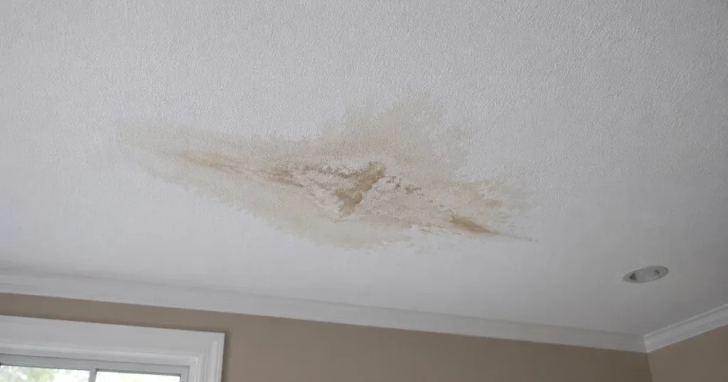 Water stain from a roof leak on a Massachusetts home ceiling