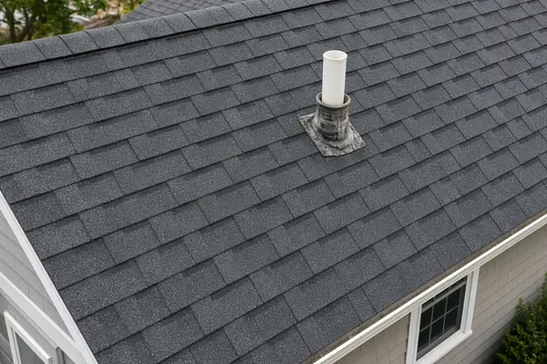 Old pipe boot reused during a new roof installation