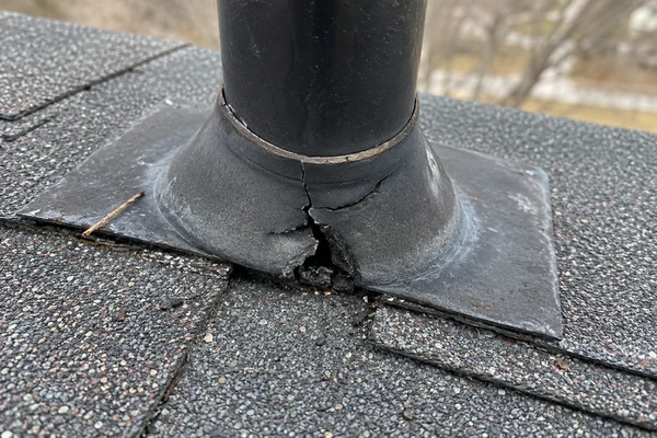 cracked pipe boot flashing causing a roof leak