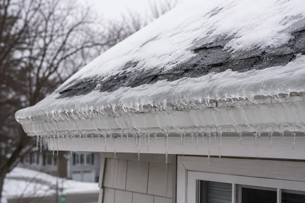 Ice dam on a Massachusetts roof in winter