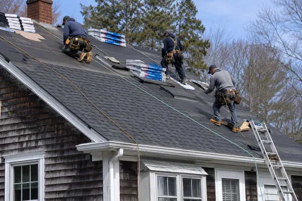 Powersol crew installing a GAF roof 