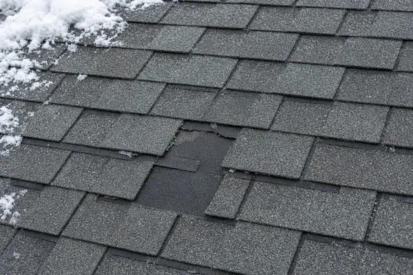 Missing shingle on a newer Massachusetts roof